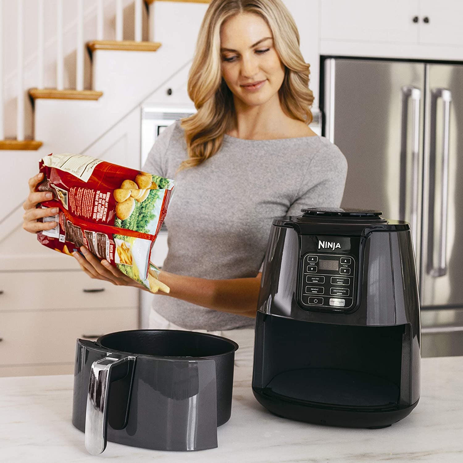 Ninja AF101 Air Fryer That Crisps, Roasts, Reheats, & Dehydrates, for Quick, Easy Meals, 4 Quart Capacity, & High Gloss Finish, Grey